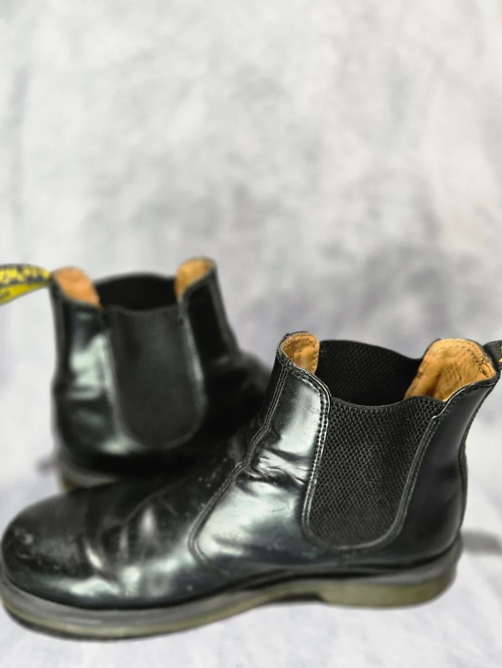 These boots are the iconic Dr. Martens 2976 Chelsea Boots
